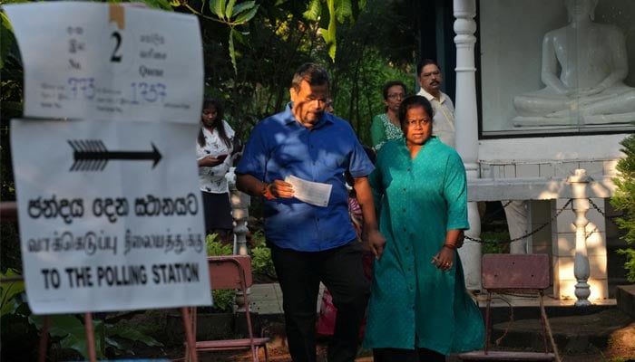 People leave a polling station after voting on the day of the parliamentary election, in Colombo, Sri Lanka, on November 14, 2024. — Reuters