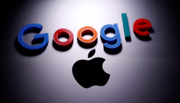 A 3D printed Google logo is placed on the Apple Macbook in this illustration taken April 12, 2020.—Reuters