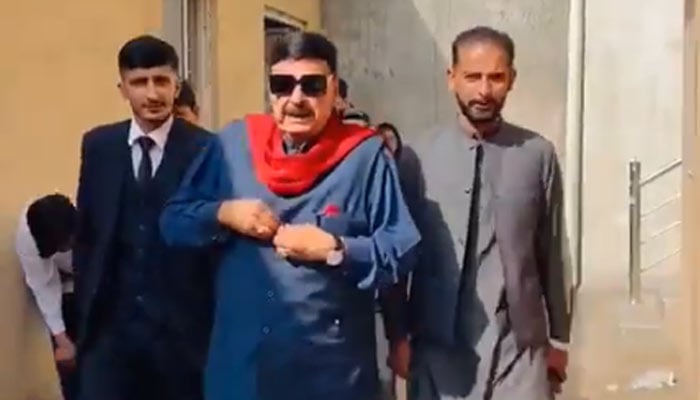 Former interior minister Shiekh Rashid walks out of local court in Islamabad after his acquittal in case pertaining to his remarks on President Asif Ali Zardari on November 15, 2024. — Reporter