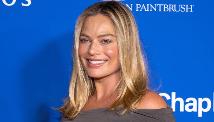 Margot Robbie appears causal in rare outing, one month after giving birth