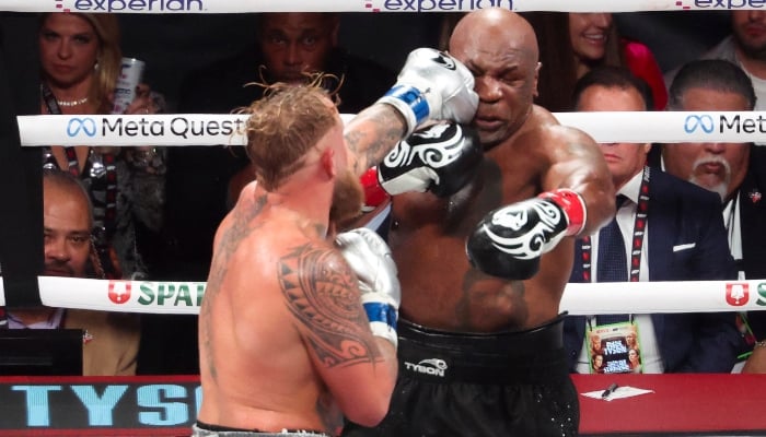 Mike Tyson (black gloves) fights Jake Paul (silver gloves) at AT&T Stadium in Arlington, Texas, United States, on November 15, 2024. —Reuters