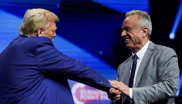 US President-elect Donald Trump (left) and Robert F Kennedy Jr seen shaking hands.— Reuters/file