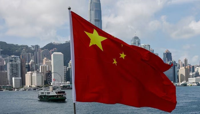 The Chinese national flag is seen in front of the financial district Central on the Chinese National Day in Hong Kong, China October 1, 2022. — Reuters