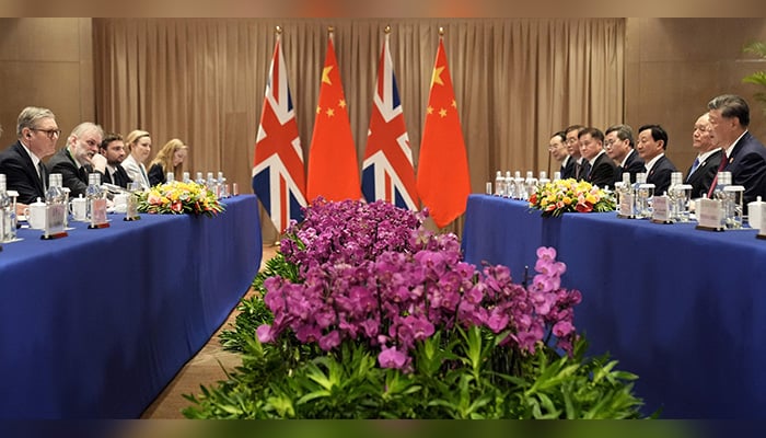 Britains PM Keir Starmer (L) and Chinas President Xi Jinping (R) attend a bilateral meeting at the Sheraton Hotel, on the sidelines of G20 summit in Rio de Janeiro, Brazil on November 18, 2024. — AFP