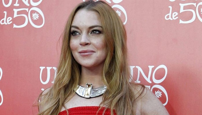 Lindsay Lohan turns heads with glam at Our Little Secret premiere