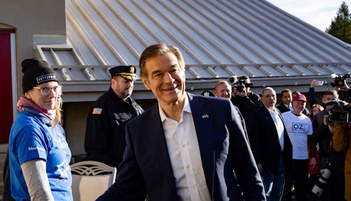 Republican Senate candidate Dr Mehmet Oz walks into his poling location to vote in the 2022 US midterm election in Bryn Athyn, Pennsylvania, US, November 8, 2022. — Reuters