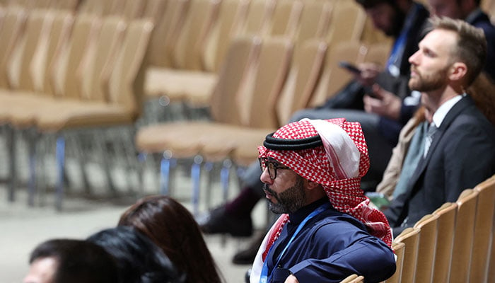 A member of Saudi Arabias delegation listens in the audience during the United Nations climate change conference COP29, in Baku, Azerbaijan, November 20, 2024. — Reuters