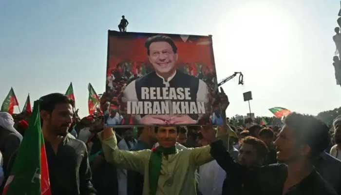 PTI workers take part in a public rally on the outskirts of Islamabad. — AFP/File