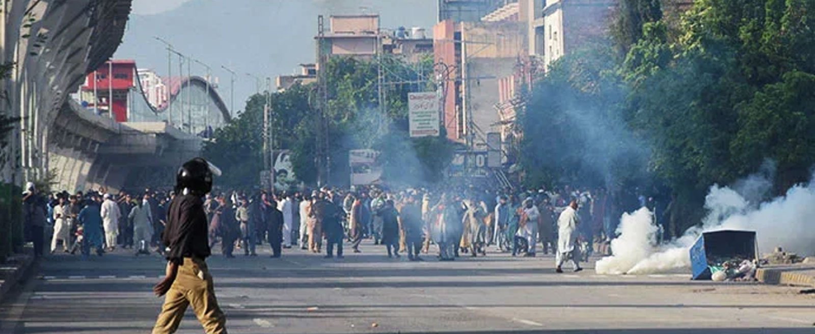 Pakistan Tehreek-e-Insaf supporters gather for a rally as tear gas is used by police officers to disperse them, in Rawalpindi, September 28, 2024. — Reuters