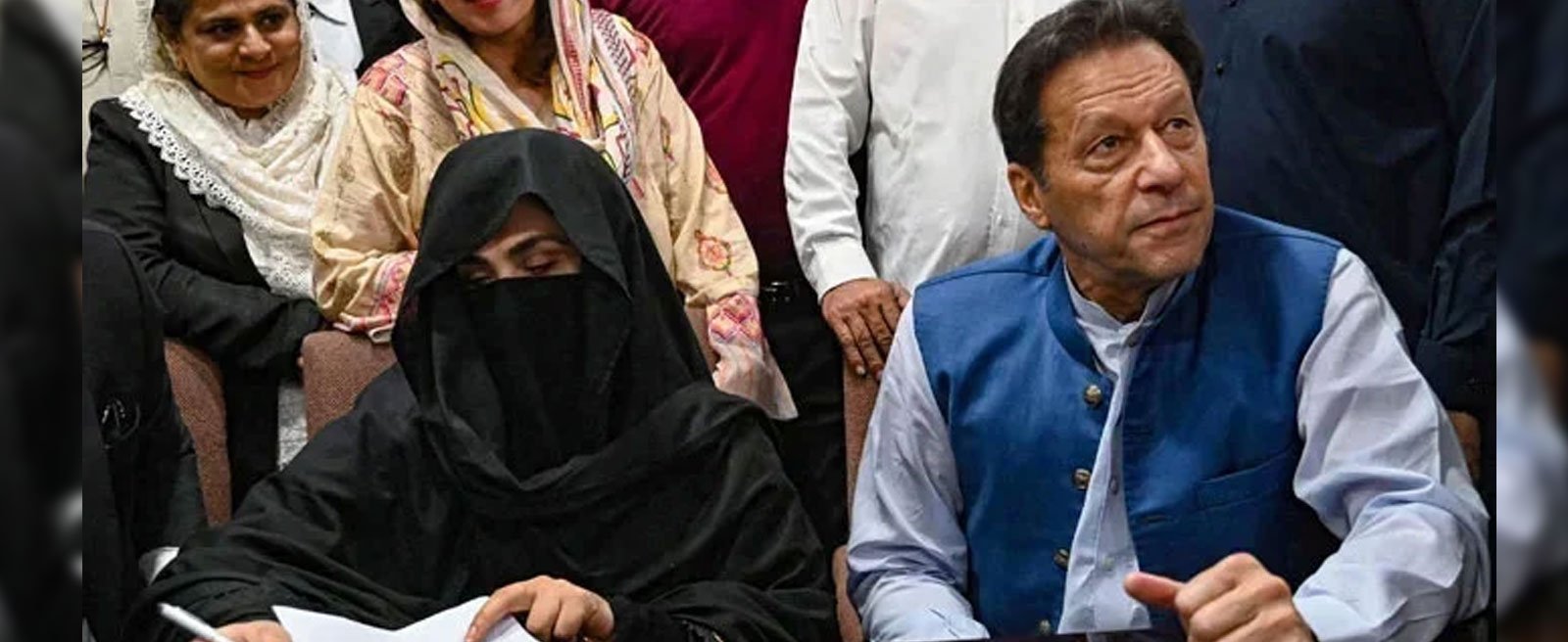 PTI founder Imran Khan (right) and his spouse Bushra Bibi. — AFP/File