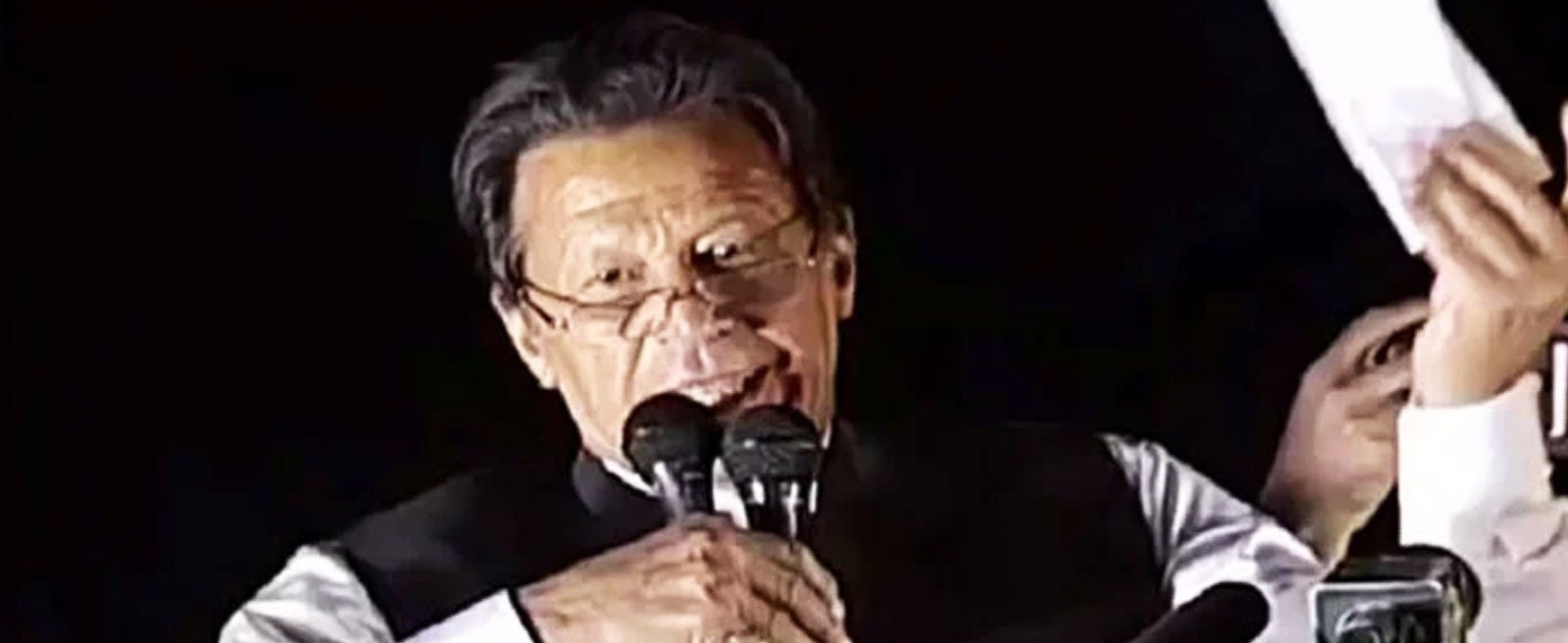 In this file photo, former prime minister Imran Khan holds what he said was a cipher which is proof of a “foreign conspiracy” to oust him from office during a rally in Islamabad in March 2022. — Twitter/@MuzamilChang