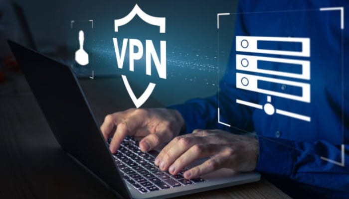 A representational image shows an a person using VPN. — Pexels