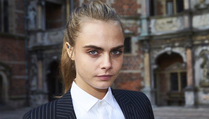 Cara Delevingne suits up for Women of Worth Celebration event