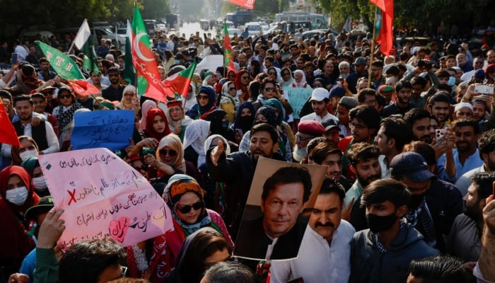 Supporters of the Pakistan Tehreek-e-Insaf (PTI) holding a protest in Karachi on February 11, 2024. —ؙReuters