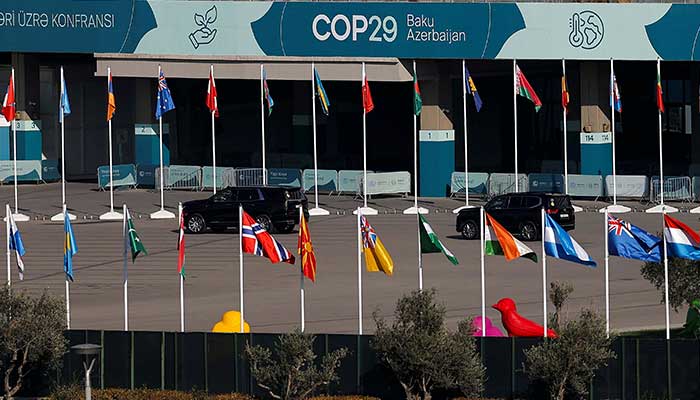 Cars drive at the territory of the COP29 United Nations climate change conference venue, in Baku, Azerbaijan on November 22, 2024. — Reuters