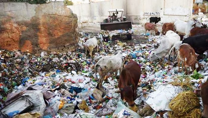 A garbage dump in a residential area of Karachi. — AFP/File