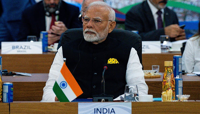 Indian PM Narendra Modi listens as President Joe Biden, not pictured, delivers remarks during an event at G20 Summit at Museum of Modern Art in Rio de Janeiro, Brazil on Monday, Nov. 18, 2024. — Reuters