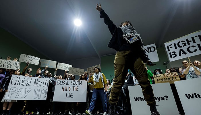 Activists shout slogans during a protest action at the COP29 United Nations climate change conference, in Baku, Azerbaijan November 23, 2024. — Reuters