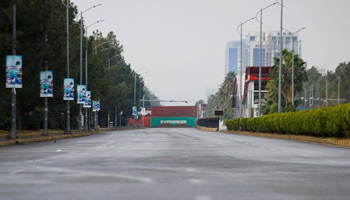 Shipping containers are kept on the main highway to prevent an anti-government rally by supporters of PTI founder Imran Khan in Islamabad — November 24, 2024. — Reuters