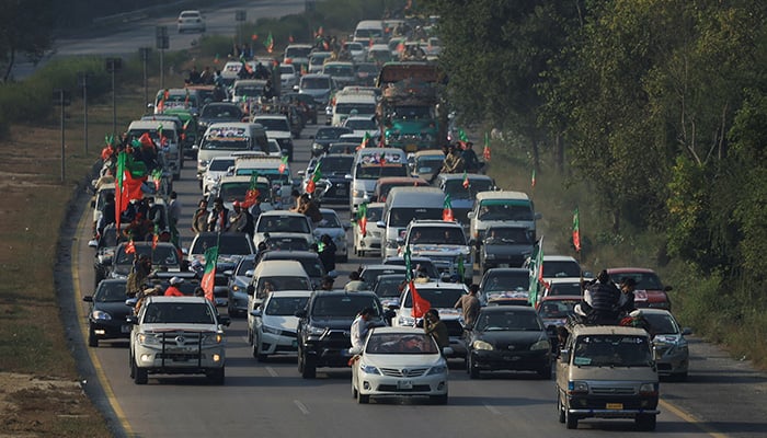 A view of a convoy by supporters of the PTI founder Imran Khan, as they head towards Islamabad, during an anti-government rally, in Peshawar — November 24, 2024. — Reuters