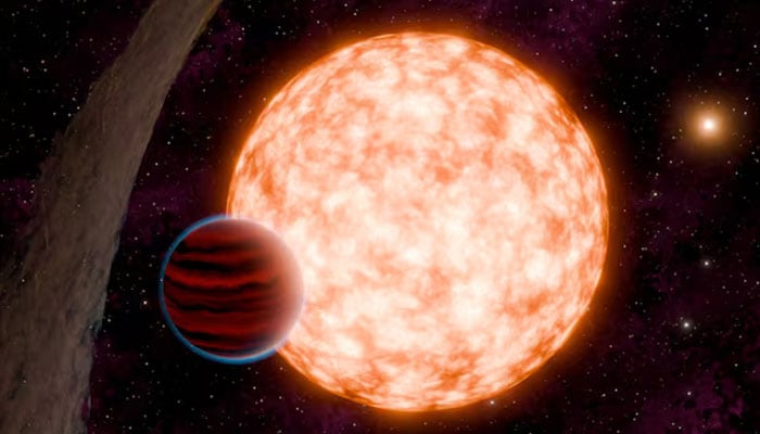 An artists depiction of a planet and its host star with a misaligned disk of material, and a binary companion in the background, is shown in this undated handout image. — Reuters/file