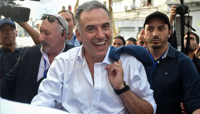 Uruguay´s presidential candidate for the Frente Amplio party, Yamandu Orsi, arrives at his bunker in the NH hotel to wait for the results of the presidential runoff election in Montevideo on November 24, 2024.— AFP