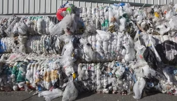 Compressed blocks of plastic waste seen at Far West Recycling in Hillsboro, Oregon, US, on October 30, 2017. —AFP