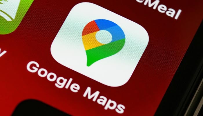 A representational image shows the Google Maps displayed on a phone screen. — Pexels