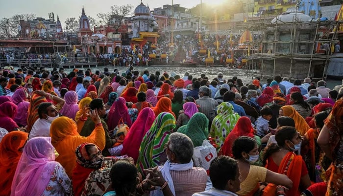 Hindu worshippers gather for evening prayers in the Ganges river town of Haridwar in 2021. — AFP