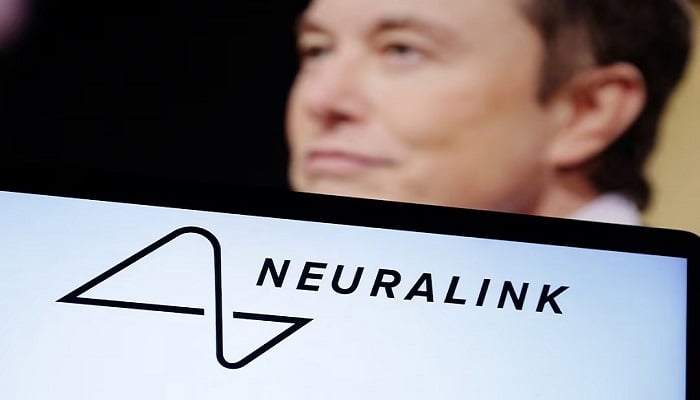 Neuralink logo and Elon Musk photo are seen in this illustration taken, December 19, 2022. — Reuters