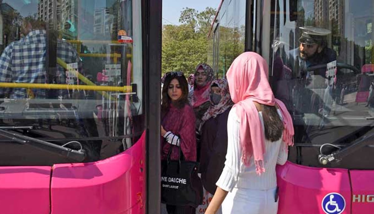 Women boarding the Pink Bus after the inauguration ceremony in Karachi on February 1, 2023. — Online