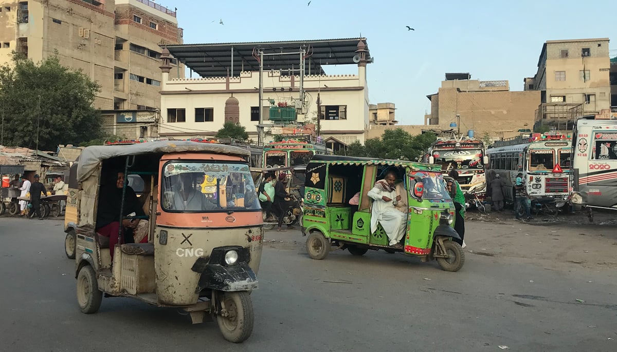 Women are seated in a rickshaw in Karachi. — Photo by Rabia Mushtaq