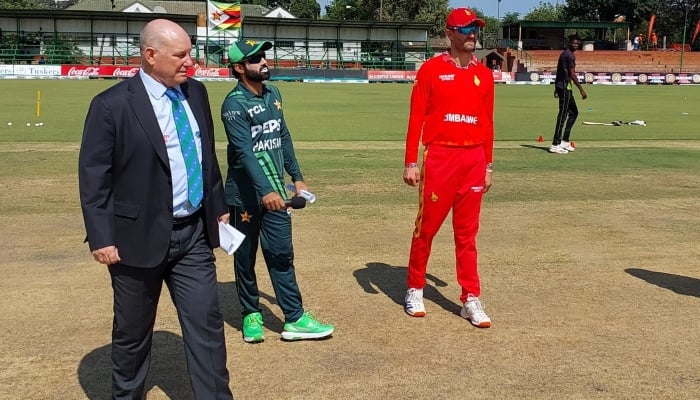 Mohamed Redwan (centre) and Craig Irvine during the draw in Bulawayo on November 26, 2024. —PCB