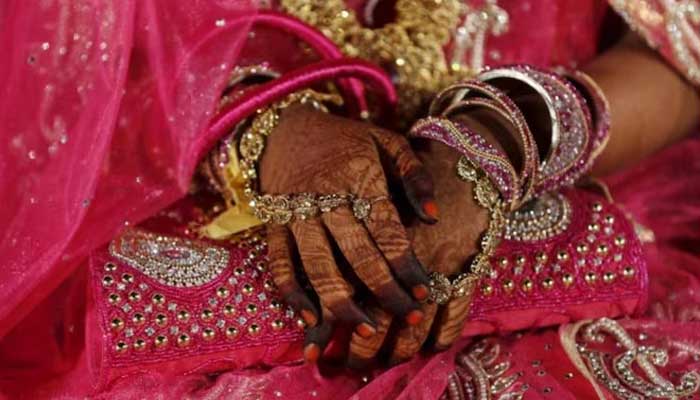 A representational image showing a brides hands at a wedding. — Reuters/File