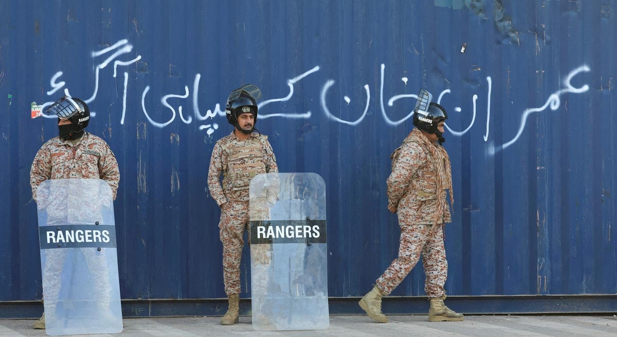 Rangers guard the area with a shipping container after security forces launched a raid on supporters of Pakistan Tehreek-e-Insaf (PTI) who had stormed the capital demanding his release on Tuesday, in Islamabad, Pakistan, November 27, 2024. — Reuters