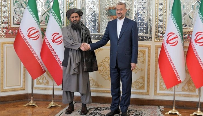 Former Iranian Foreign Minister Hossein Amir-Abdollahian welcomes head of the Talibans political bureau Mullah Abdul Ghani Baradar in Tehran. — Iran’s Foreign Ministry/File