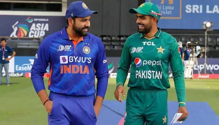 Indian captain Rohit Sharma and Pakistani captain Babar Azam spotted together during a cricket match. — Reuters/File