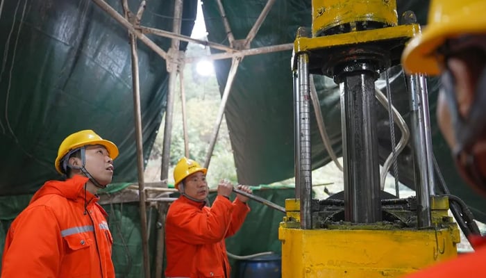 Mining experts drilled down around 6,600 feet below the ground and identified more than 40 veins of gold ore in ingjiang, Hunan province, China. — Xinua/file