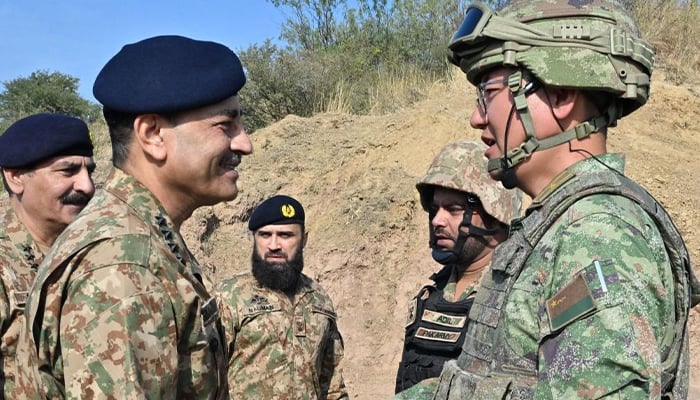 Chief of Army Staff General Syed Asim Munir talking to a Chinese military official at the NCTC, Pabba on november 29, 2024. — ISPR