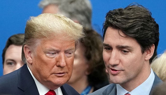 An undated image shows US President-elect Donald Trump talking with Canadas Prime Minister Justin Trudeau during a North Atlantic Treaty Organization Plenary Session at the NATO summit in Watford, Britain. — Reuters/File