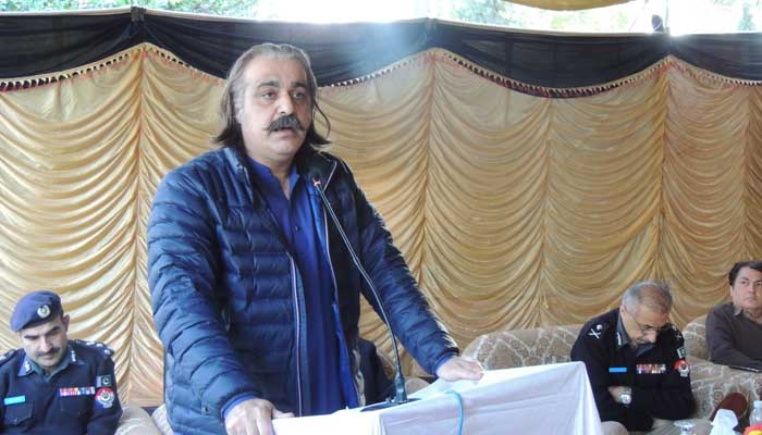 Khyber Pakhtunkhwa Chief Minister Ali Amin Gandapur speaks during a grand jirga, organised in Kohat, in wake of deadly clashes in Kurram district, November 30, 2024. — Reporter