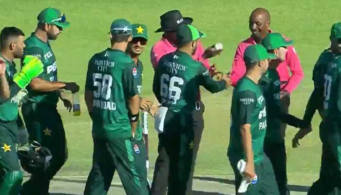 Pakistan team shakes hands with umpires as they celebrates victory over Zimbabwe in first T20I in Bulawayo, Zimbabwe, December 1, 2024. — X/Screengrab via live stream