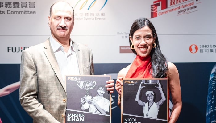 Jansher Khan (left) and Nicol David pose for a picture in Hong Kong on December 1, 2024. —PSA