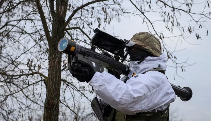 A Ukrainian serviceman holds a Stinger anti-aircraft missile as he attends a joint drills of armed forces, national guard and Security Service of Ukraine (SBU) near the border with Belarus, amid Russias attack on Ukraine in Rivne region, Ukraine February 11, 2023. — Reuters