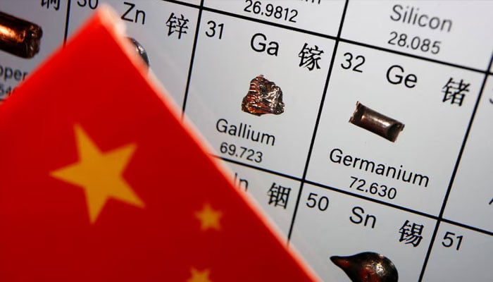 The flag of China is placed next to the elements of Gallium and Germanium on a periodic table, in this illustration picture taken on July 6, 2023. — Reuters