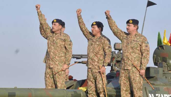 COAS General Asim Munir (left) pictured on top of a Pakistan Army tank during his visit of a field training exercise near Narowal and Sialkot in this image released on December 3, 2024. — ISPR