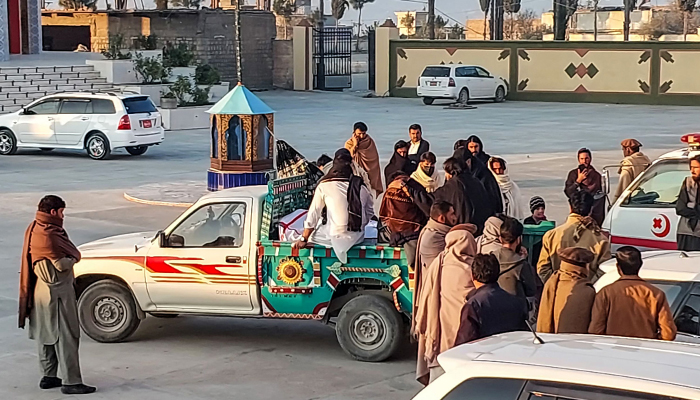 Relatives transport a dead body of a victim who was killed in Kurram district at a mosque in Parachinar, the mountainous Khyber Pakhtunkhwa province, on November 22, 2024. — AFP