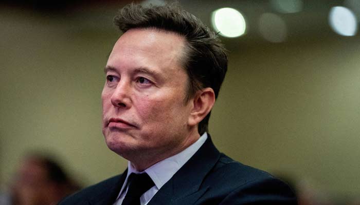 Tesla CEO and X owner Elon Musk listens as US President-elect Donald Trump speaks during a meeting with House Republicans at the Hyatt Regency hotel in Washington, DC, US on November 13, 2024. — Reuters