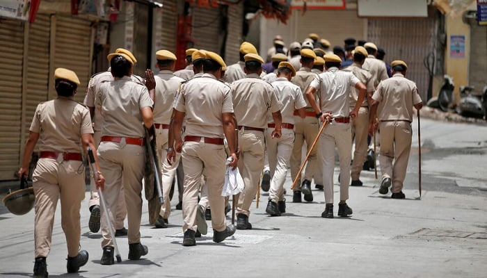 A representational image of the members of the Indian police patrolling a street in Udaipur in the northwestern state of Rajasthan, India on July 1, 2022. — Reuters