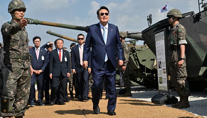 South Korean President Yoon Suk-yeol inspects military vehicles after a joint South Korean-US military exercise at the Songjin firefighting training range in Bucheon, South Korea on June 15, 2023. – Reuters